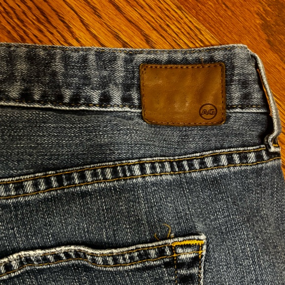 Ag denim pants size 33R women’s. Ripped knees. Straight leg. Previously owned. - Picture 8 of 9
